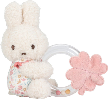 Mała holenderska grzechotka Miffy z kwiatami na szczęście