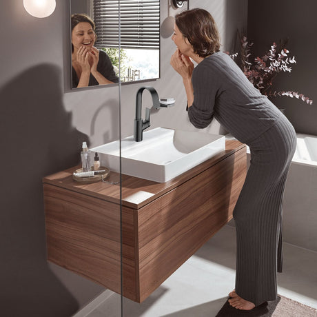 Hansgrohe Vivinis jednouchwytowa bateria umywalkowa 210 z obrotową wylewką i wyciąganym odpływem czarny chrom szczotkowany