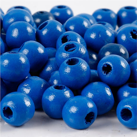 Koraliki drewniane firmy Creativ cc 12 mm niebieskie 40 sztuk
