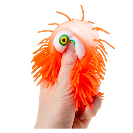 Puchowa piłka Duckiez z oczkami, 10cm