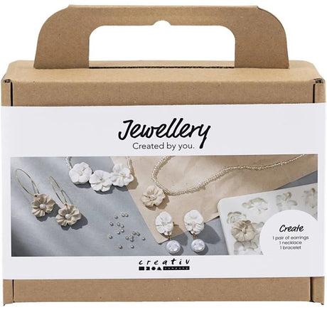 Firma Creativ https: www.cchobby.nl mini-hobbyzestaw-biżuterii-kolczyki-bransoletka-i-naszyjnik-z-kwiatkiem-design-beżowy-jasnobeżowy-beżowy-1-pudełko