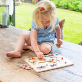 Drewniane puzzle Engelhart z pojazdami o wymiarach 30x23 cm