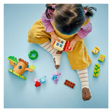 Lego Duplo - Zabawka konstrukcyjna ogrodu i domku na drzewie Świnki Peppy (10431)