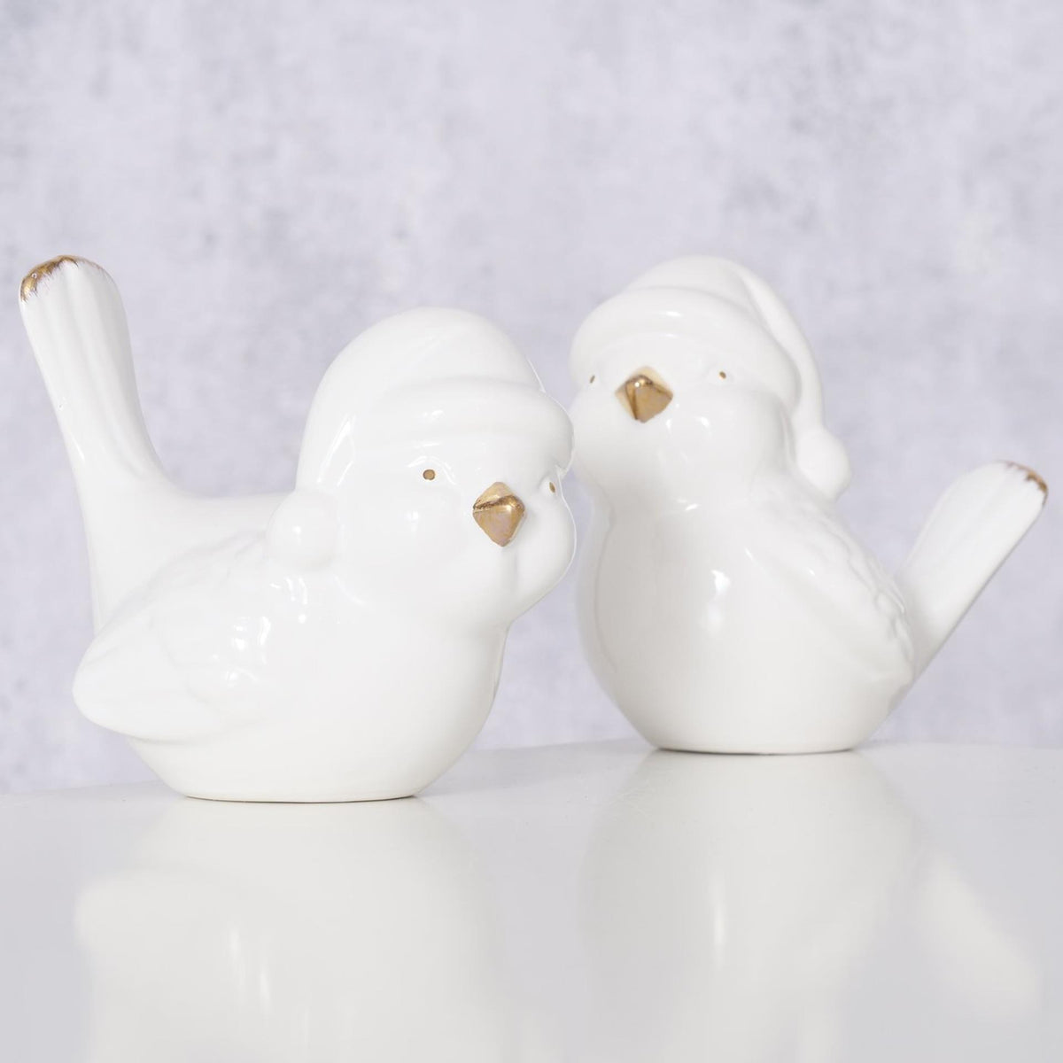 Boltze home bird ville dolomit h9cm białe złoto z czapką Świętego Mikołaja