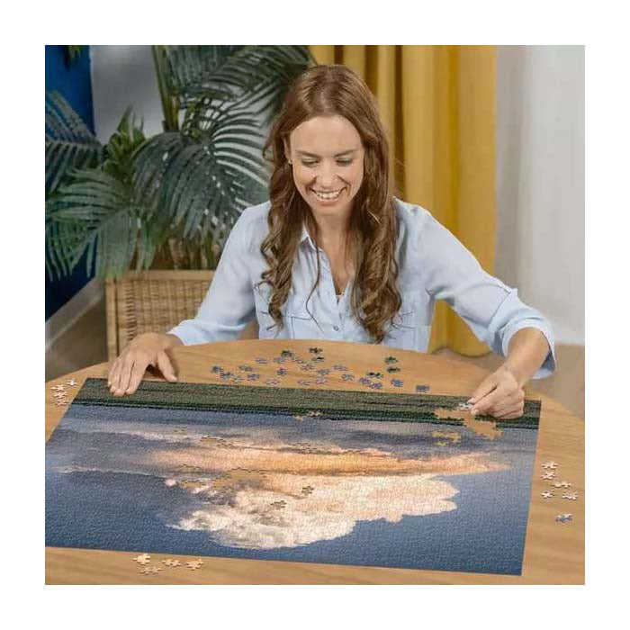 Puzzle Ravensburger z krajobrazem cumulus epic, składające się z 1500 elementów.
