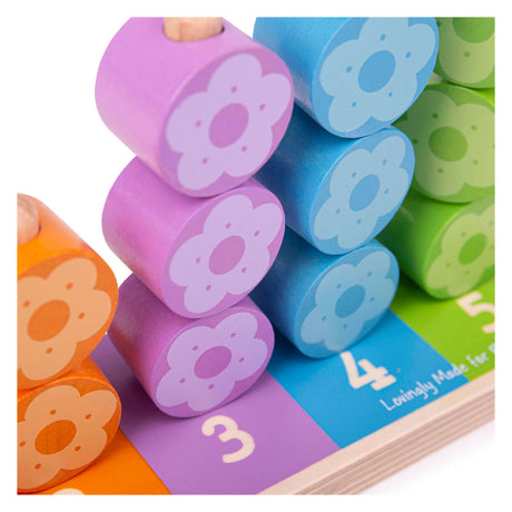 Bigjigs zabawki Bigjigs drewniane kwiaty do układania w stosy, 16 sztuk.