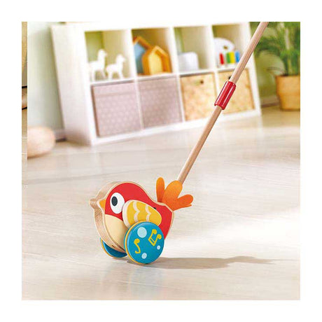 Drewniany pchacz Hape Lilly Bird z dźwiękiem