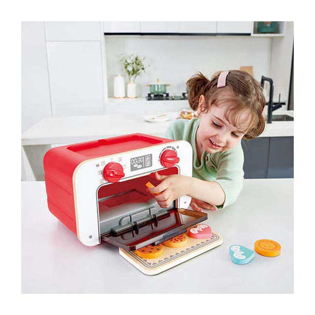 Hape Zabawkowy piekarnik z magicznymi ciasteczkami - Zestaw z piekarnikiem zmieniającym kolor, od 3 lat