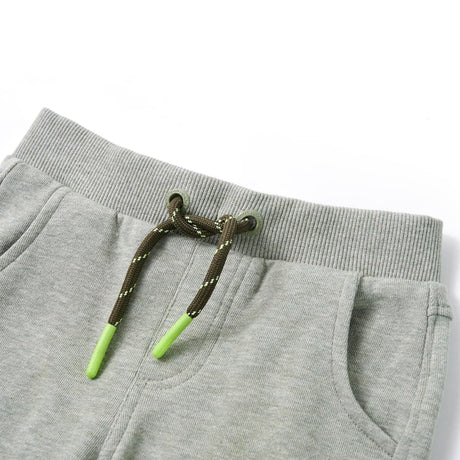 Dziecięce spodnie dresowe VidaXL 116 w kolorze jasnego khaki
