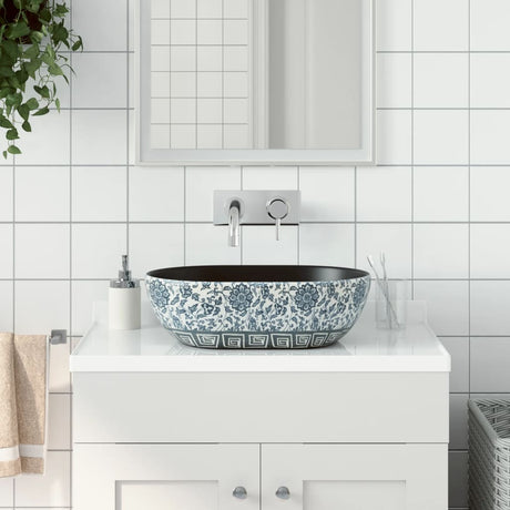 Owalny zlew nablatowy Vidaxx 47x33x13 cm ceramiczny czarno-niebieski