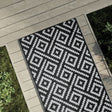 Vidaxl buitenkleed arakil 80x250 cm polypropeen wit en zwart