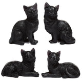 Miniaturowe figurki czarnego kota