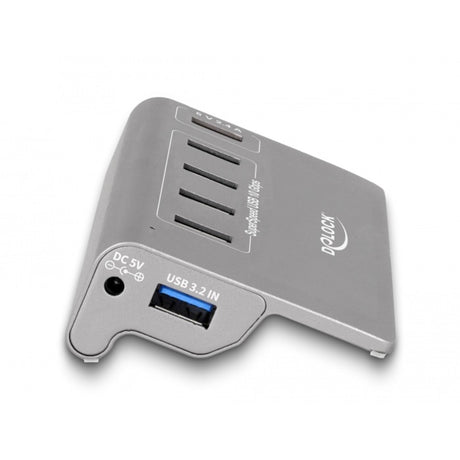 Delock Koncentrator USB 10 Gbps z 4 portami USB-A + 1 portem szybkiego ładowania (szary, z zasilaczem)