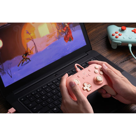 Przewodowy gamepad 8bitdo Ultimate 2c (brzoskwiniowo-jasnożółty)