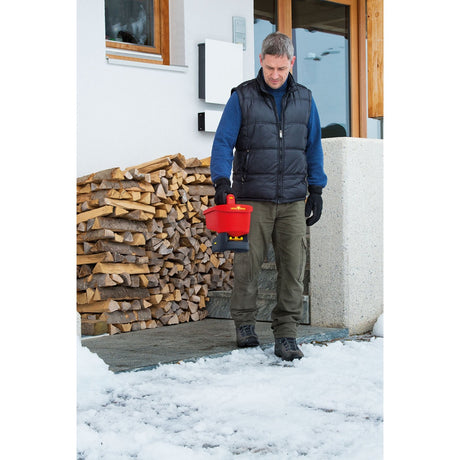 Rozrzutnik ręczny Wolf-garten uniwersalny we-b - regulowana szerokość rozrzucania 0,5 m-2,5 m - napęd akumulatorowy - pojemność 3 litry