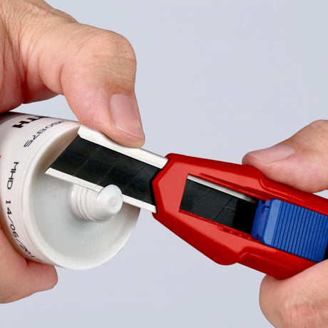 Uniwersalny nóż do cięcia pudełek Knipex Cutix (czerwony niebieski, w zestawie ostrza noża 2)