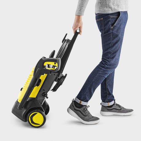 Domowy odkurzacz wysokociśnieniowy Kärcher k 5 wcm premium (żółty czarny, z urządzeniem do czyszczenia strumieniowego, szpulą na wąż i środkiem do czyszczenia powierzchni)