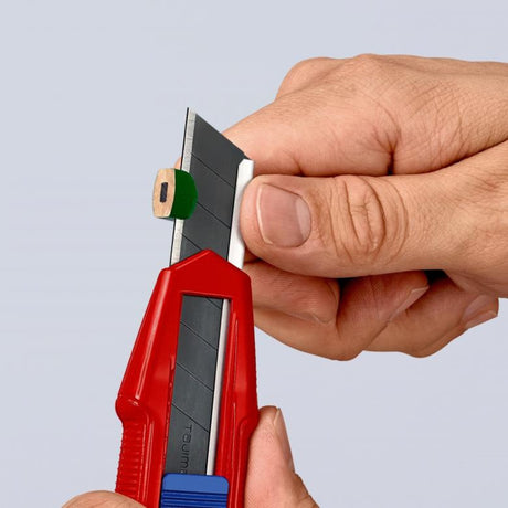 Uniwersalny nóż do cięcia pudełek Knipex Cutix (czerwony niebieski, w zestawie ostrza noża 2)