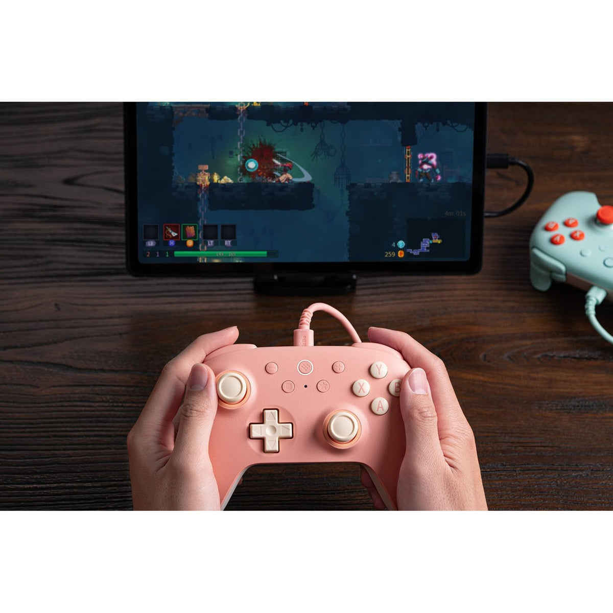 Przewodowy gamepad 8bitdo Ultimate 2c (brzoskwiniowo-jasnożółty)