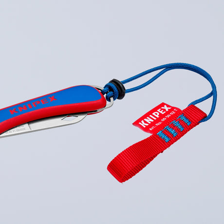 Scyzoryk dla elektryka Knipex 16 20 50 sb (czerwony niebieski, długość 120mm)
