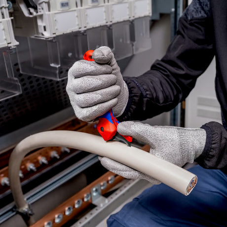 Nóż do kabli Knipex ze stopką przesuwną (czerwony niebieski)