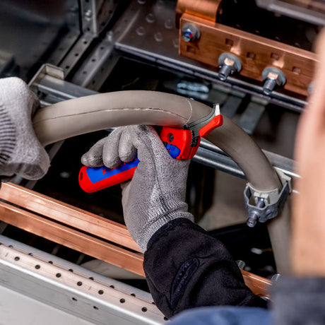 Nóż do kabli Knipex ze stopką przesuwną (czerwony niebieski)